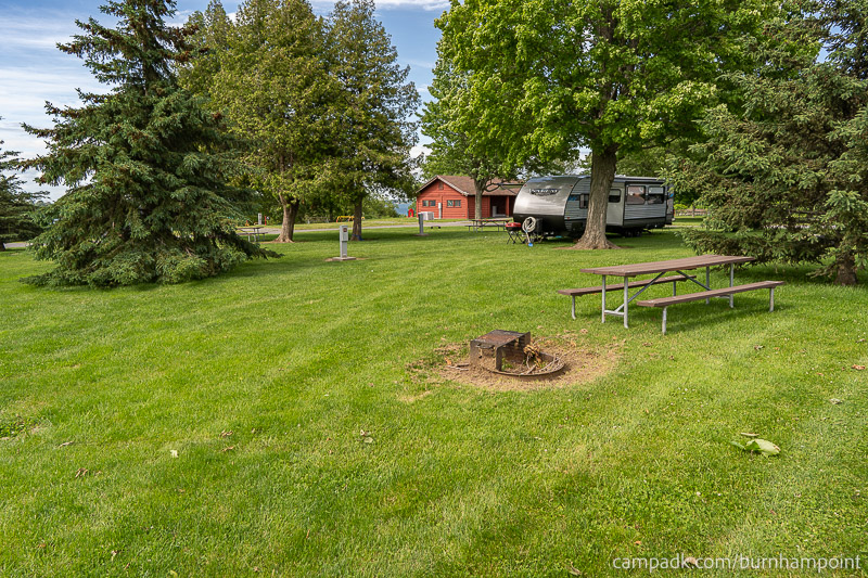 Campsite Photo of Site 8 at Burnham Point State Park, New York - Looking at Site from Road Sign Visible