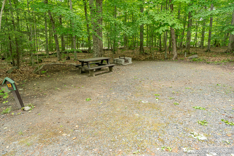 Campsite Photo of Site 13 at Caroga Lake Campground, New York - Looking at Site from Road Sign Visible