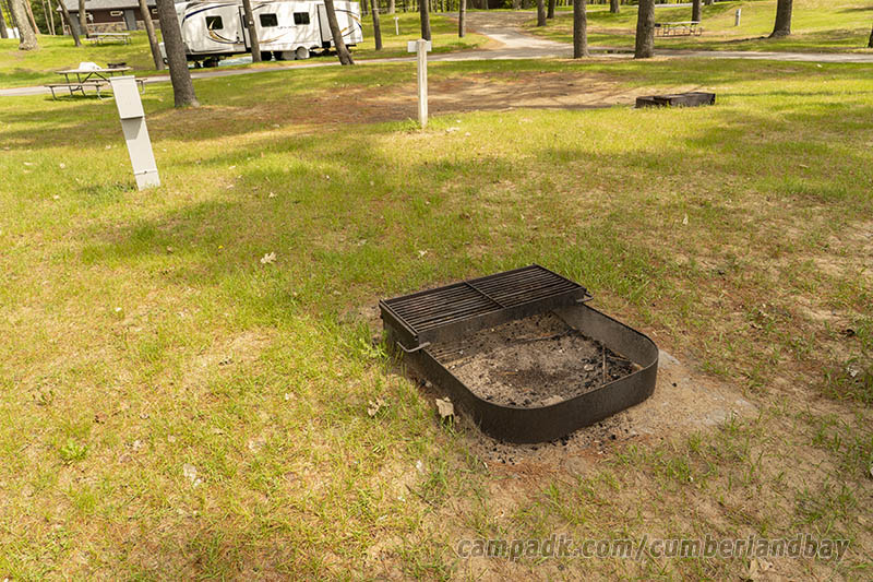 Campsite Photo of Site 52 at Cumberland Bay State Park, New York - Fireplace View