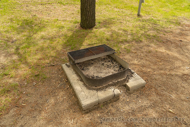 Campsite Photo of Site 39 at Cumberland Bay State Park, New York - Fireplace View