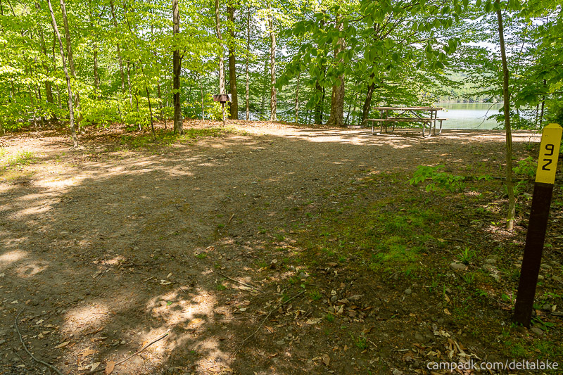 Campsite Photo of Site 92 at Delta Lake State Park, New York - Looking at Site from Road Sign Visible