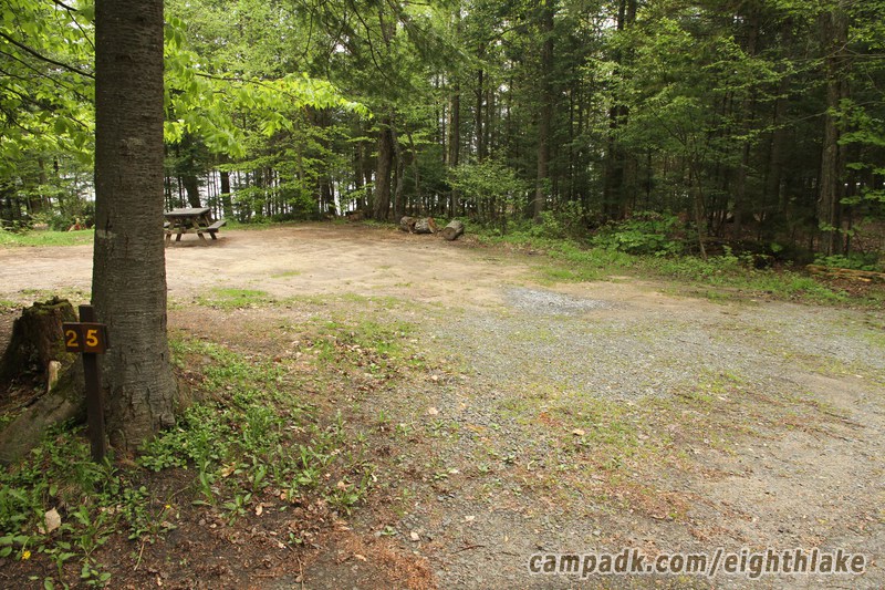 Campsite Photo of Site 25 at Eighth Lake Campground, New York - Looking at Site From Road Sign Visible