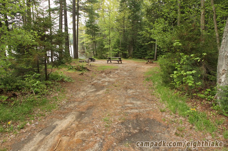 Campsite Photo of Site 112 at Eighth Lake Campground, New York - Looking at Site From Part Way In