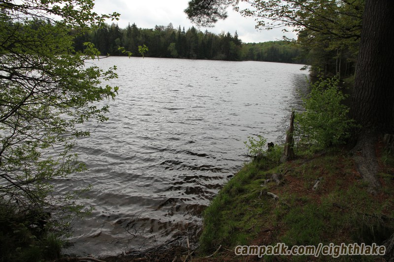 Campsite Photo of Site 112 at Eighth Lake Campground, New York - Shoreline and View