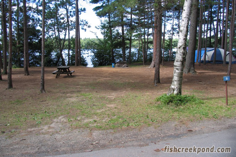 Campsite Photo of Site 1 at Fish Creek Pond Campground, New York - Looking at Site from Road Sign Visible
