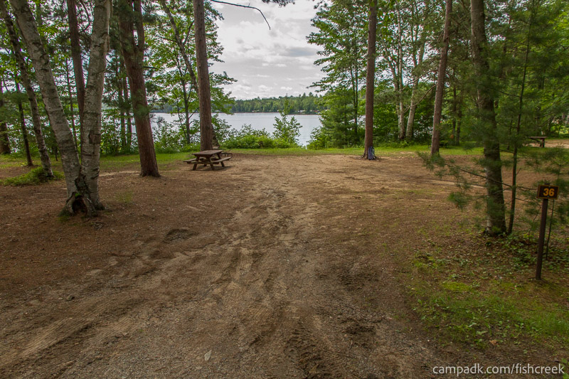 Campsite Photo of Site 46 at Fish Creek Pond Campground, New York - Looking at Site from Road Sign Visible