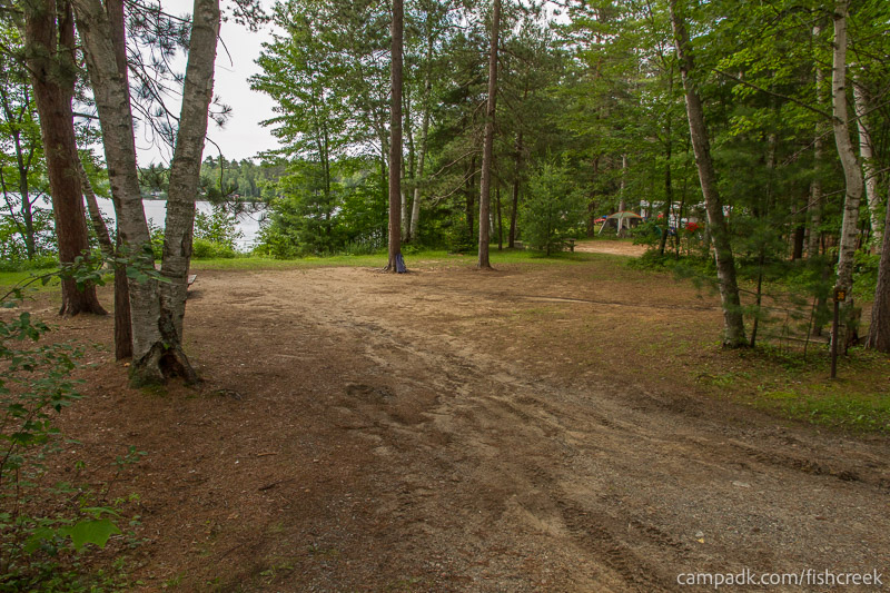 Campsite Photo of Site 46 at Fish Creek Pond Campground, New York - Looking at Site from Road Sign Visible