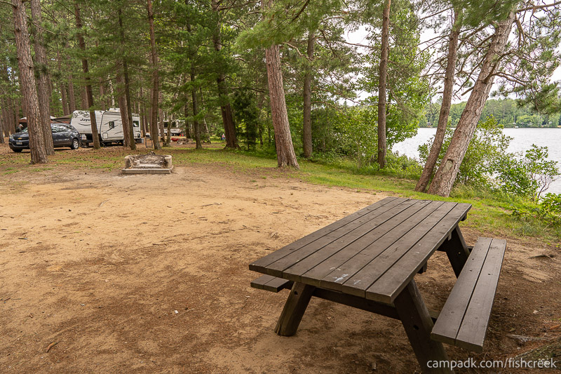 Campsite Photo of Site 106 at Fish Creek Pond Campground, New York - Cross Site View