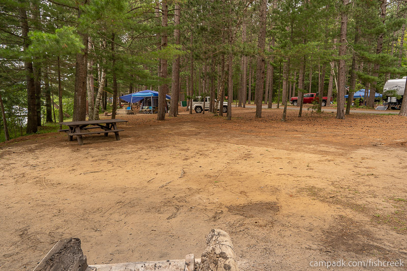 Campsite Photo of Site 106 at Fish Creek Pond Campground, New York - Cross Site View