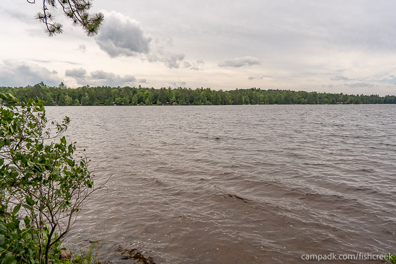 Campsite Photo of Site 106 at Fish Creek Pond Campground, New York - View from Shoreline