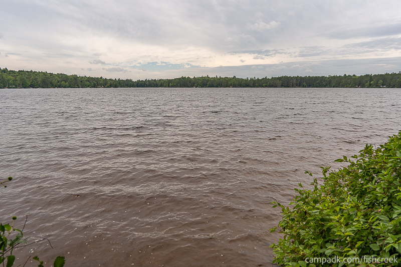 Campsite Photo of Site 106 at Fish Creek Pond Campground, New York - View from Shoreline