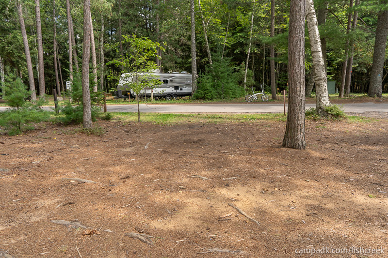 Campsite Photo of Site 1 at Fish Creek Pond Campground, New York - Looking Back Towards Road
