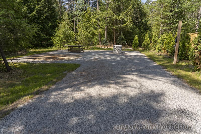 Campsite Photo of Site T65 at Frontier Town Campground, New York - Looking at Site from Part Way In