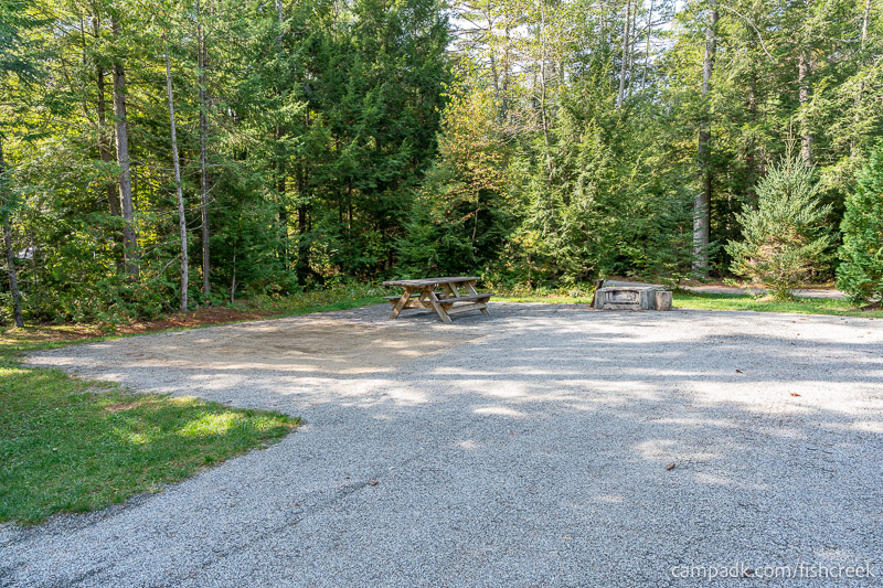 Campsite Photo of Site T65 at Frontier Town Campground, New York - Looking at Site from Part Way In