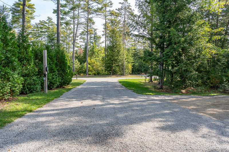 Campsite Photo of Site T65 at Frontier Town Campground, New York - Looking Back Towards Road