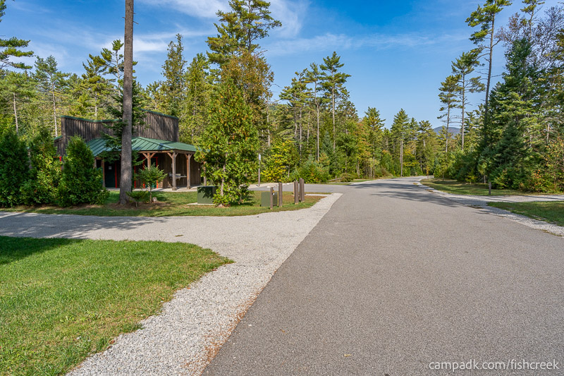 Campsite Photo of Site T65 at Frontier Town Campground, New York - View Down Road from Campsite