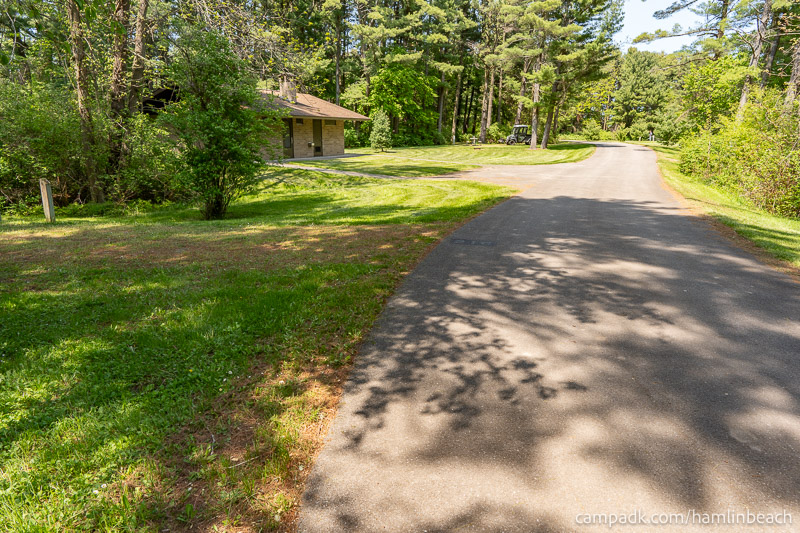 Campsite Photo of Site 216 at Hamlin Beach State Park, New York - View Down Road from Campsite
