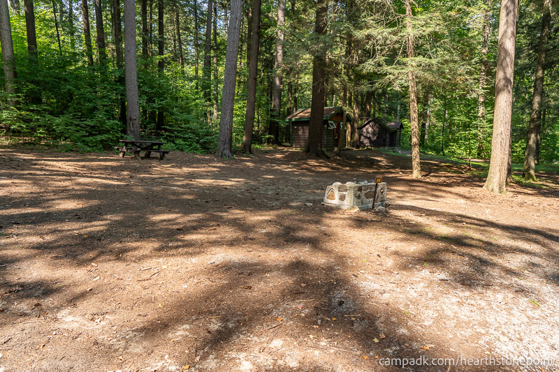 Campsite Photo of Site 44 at Hearthstone Point Campground, New York - Looking at Site from Road Sign Visible