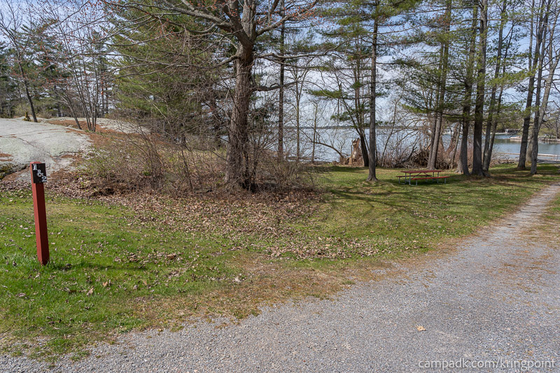 Campsite Photo of Site 2 at Kring Point State Park, New York - Looking at Site from Road Sign Visible