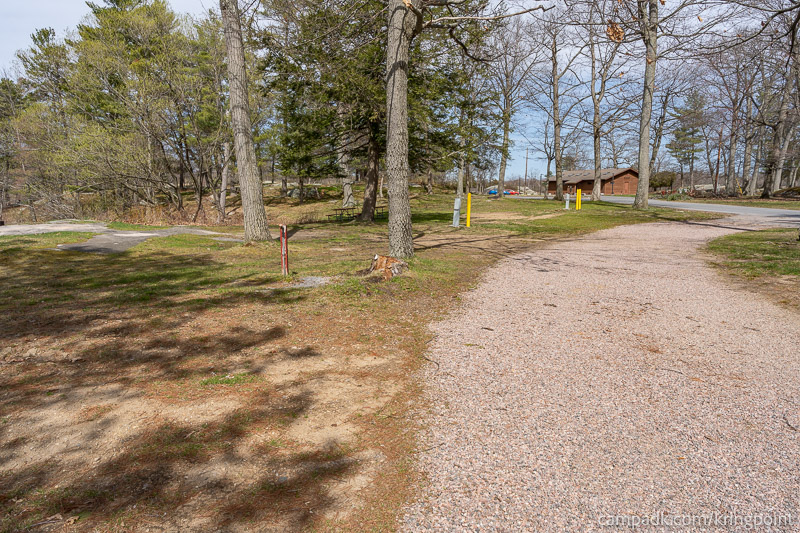 Campsite Photo of Site 19 at Kring Point State Park, New York - View Down Road from Campsite