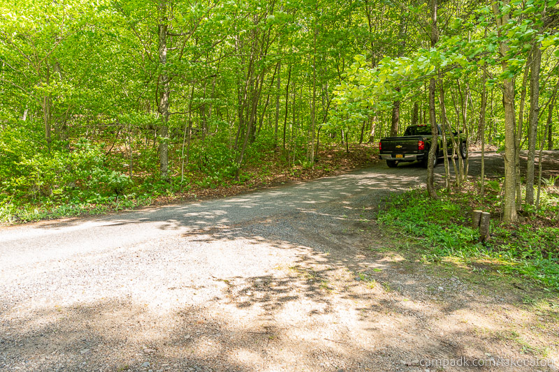 Campsite Photo of Site 100 at Lake Eaton Campground, New York - Looking Back Towards Road