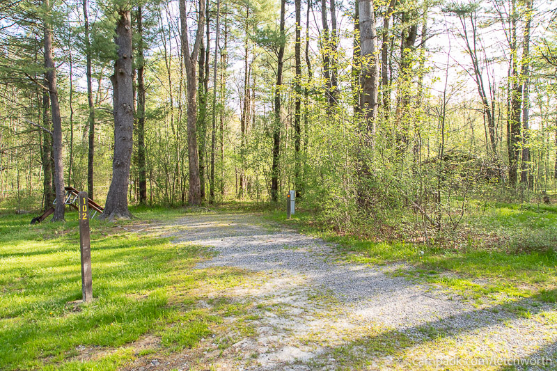 Campsite Photo of Site 102 at Letchworth State Park, New York - Looking at Site from Road Sign Visible