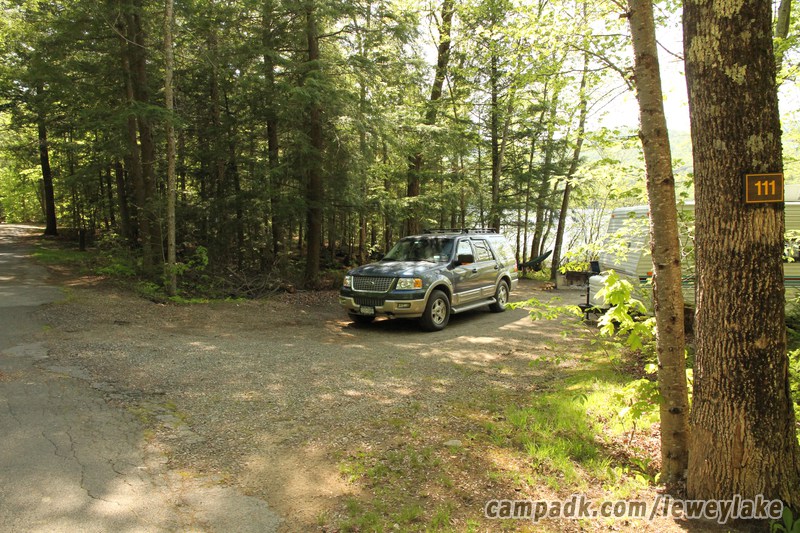 Campsite Photo of Site 111 at Lewey Lake Campground, New York - Looking at Site from Road Sign Visible