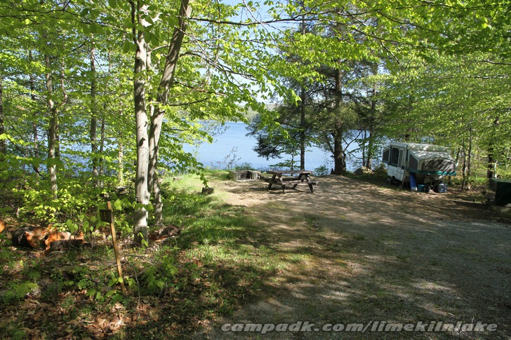 Campsite Photo of Site 162 at Limekiln Lake Campground, New York - Looking at Site from Road Sign Visible