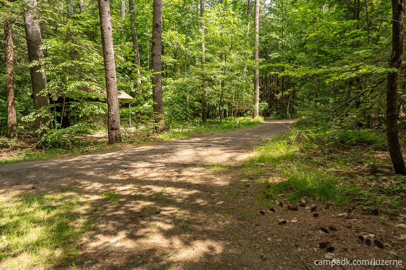 Campsite Photo of Site 138 at Luzerne Campground, New York - Looking Back Towards Road