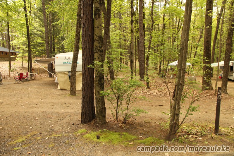 Campsite Photo of Site 28 at Moreau Lake State Park, New York - Looking at Site from Road Sign Visible