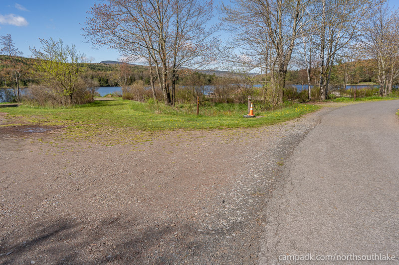Campsite Photo of Site 150 at North South Lake Campground, New York - View Down Road from Campsite