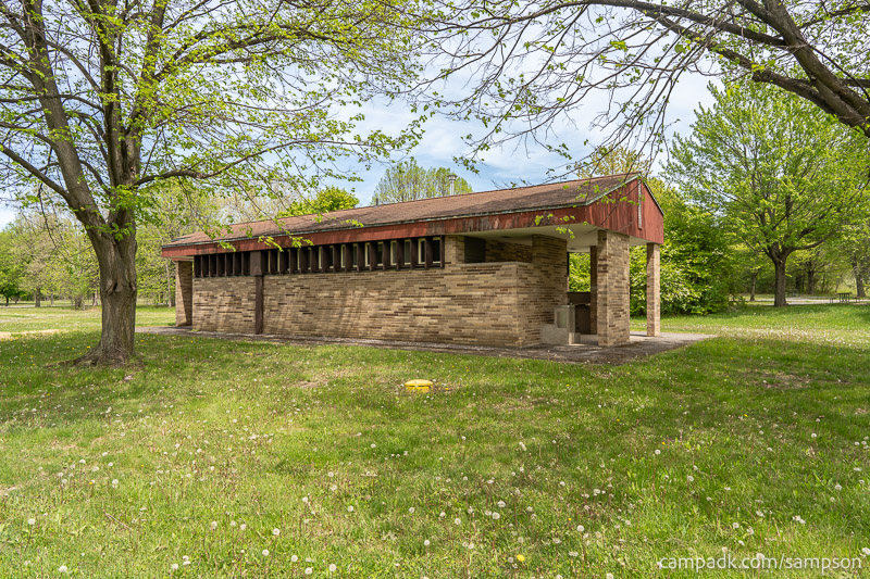 Campsite Photo of Site 85 at Sampson State Park, New York - Washroom Across the Road
