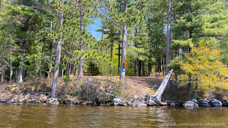 Campsite Photo of Site 65 at Saranac Lake Islands Campground, New York - View From Water on Approach