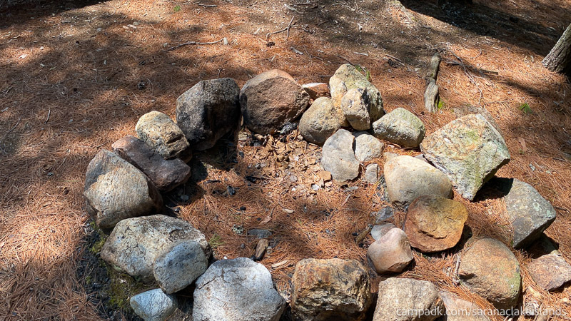 Campsite Photo of Site 65 at Saranac Lake Islands Campground, New York - Fireplace