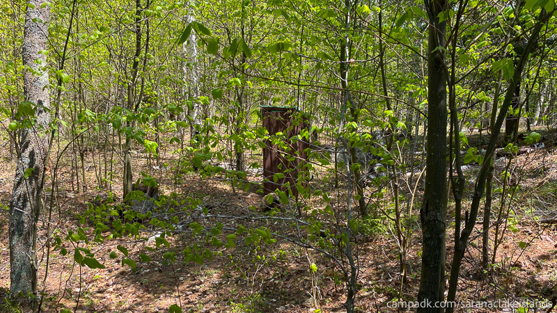 Campsite Photo of Site 65 at Saranac Lake Islands Campground, New York - Path to Outhouse
