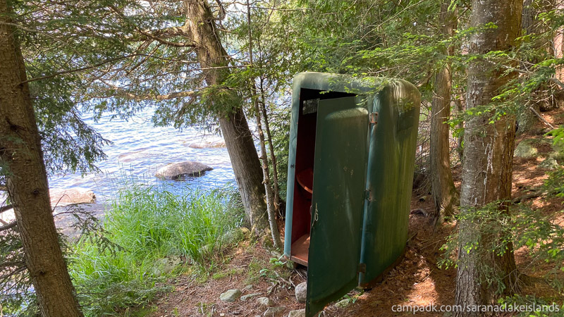 Campsite Photo of Site 5 at Saranac Lake Islands Campground, New York - Outhouse