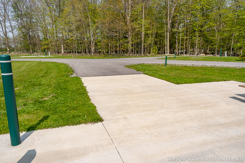 Campsite Photo of Site 121 at Southwick Beach State Park, New York - Looking Back Towards Road