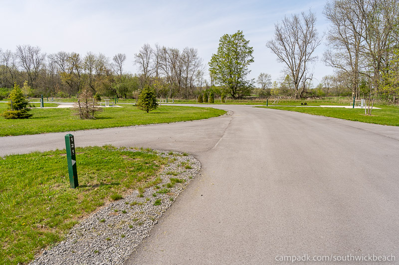 Campsite Photo of Site 121 at Southwick Beach State Park, New York - View Down Road from Campsite