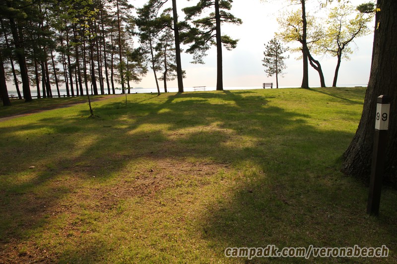 Campsite Photo of Site 9 at Verona Beach State Park, New York - Looking at Site from Road Sign Visible
