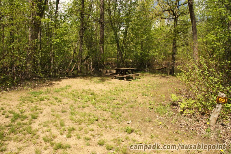 Campsite Photo of Site 95 at Ausable Point Campground, New York - Looking at Site from Road Sign Visible