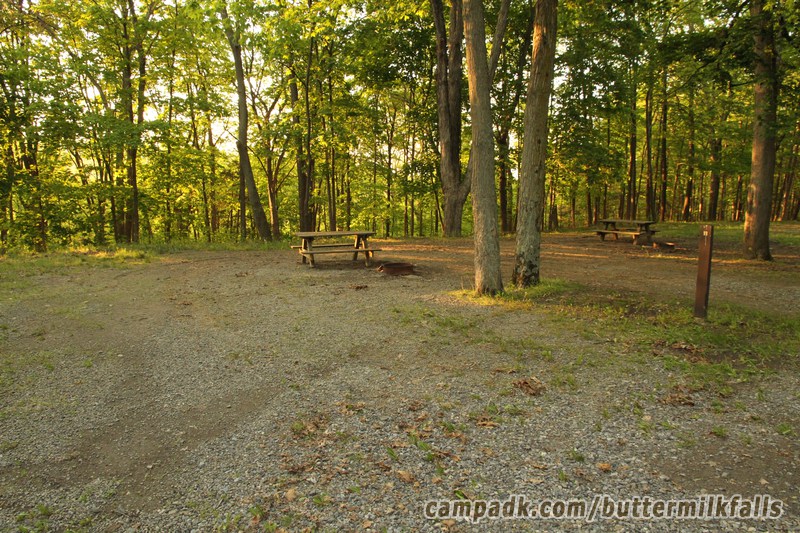 Campsite Photo of Site 11 at Buttermilk Falls State Park, New York - Looking at Site from Road Sign Visible
