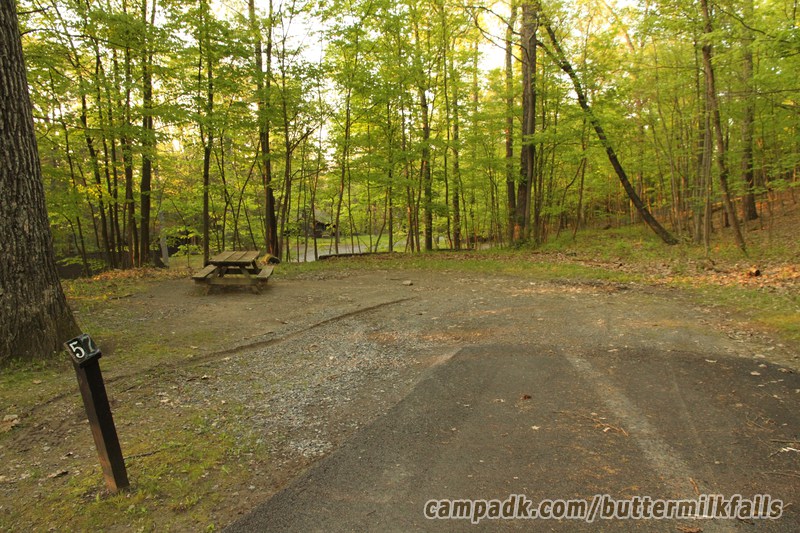 Campsite Photo of Site 57 at Buttermilk Falls State Park, New York - Looking at Site from Road Sign Visible