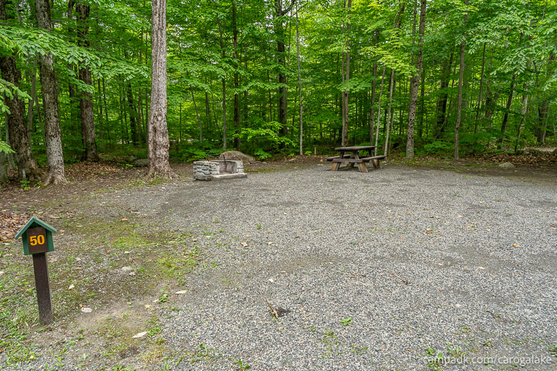 Campsite Photo of Site 50 at Caroga Lake Campground, New York - Looking at Site from Road Sign Visible