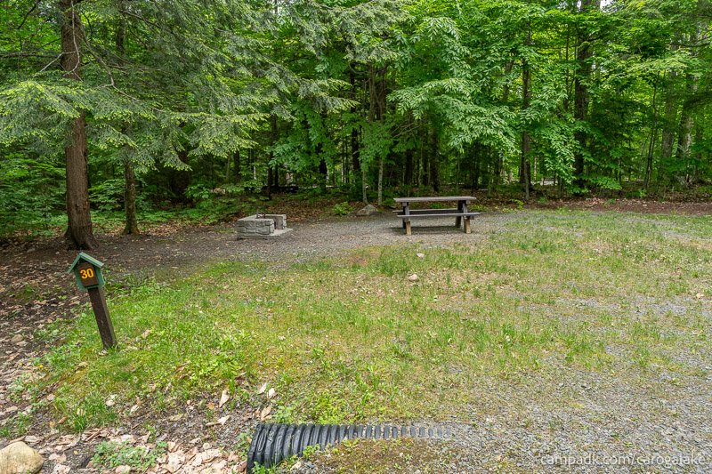 Campsite Photo of Site 30 at Caroga Lake Campground, New York - Looking at Site from Road Sign Visible