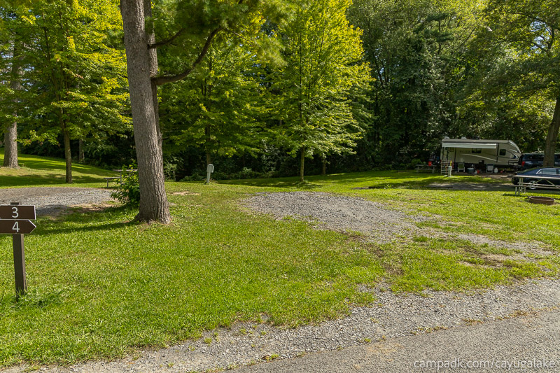 Campsite Photo of Site 4 at Cayuga Lake State Park, New York - Looking at Site from Road Sign Visible