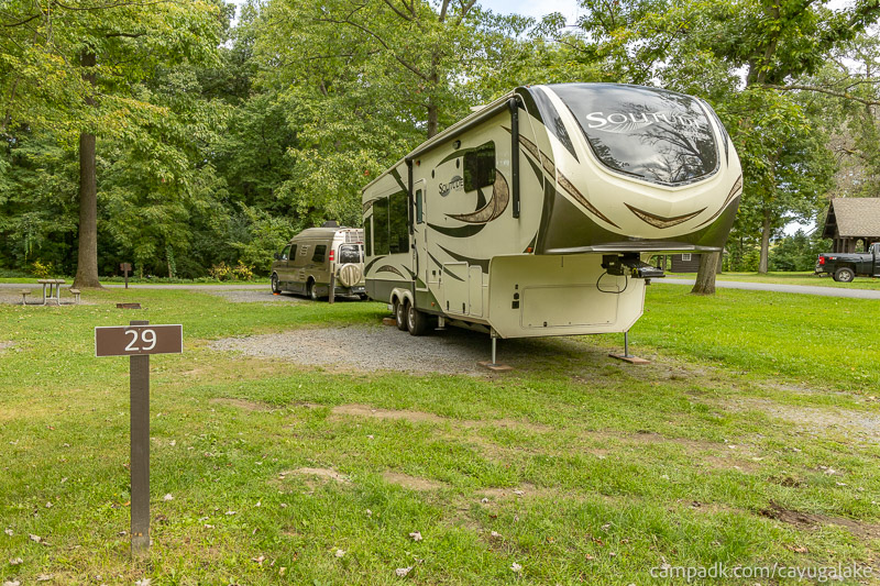 Campsite Photo of Site 29 at Cayuga Lake State Park, New York - Looking at Site from Road Sign Visible
