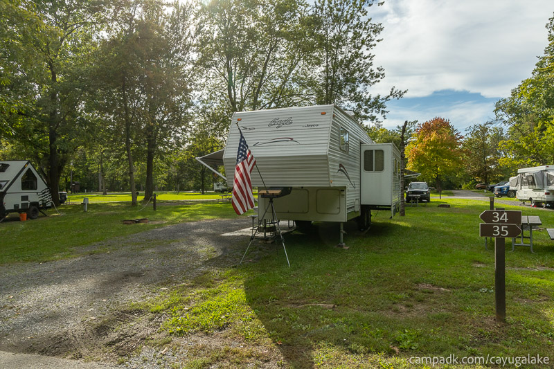 Campsite Photo of Site 34 at Cayuga Lake State Park, New York - Looking at Site from Road Sign Visible