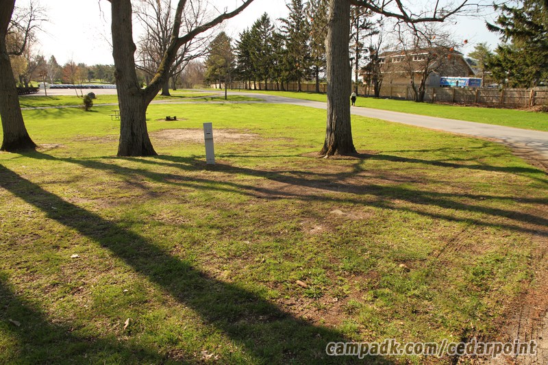 Campsite Photo of Site 50 at Cedar Point State Park, New York - Looking at Site from Road Sign Visible