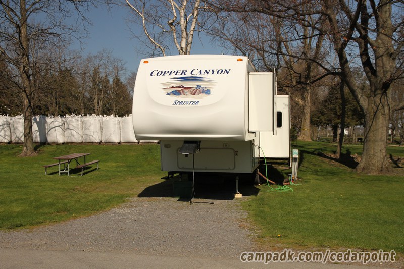 Campsite Photo of Site 79 at Cedar Point State Park, New York - Looking at Site from Road Sign Visible