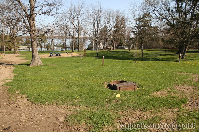 Campsite Photo of Site 119 at Cedar Point State Park, New York - Looking at Site from Road Sign Visible
